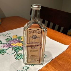 Vintage glass Watkins vanilla bottle 9 1/2 inches tall Perfect condition